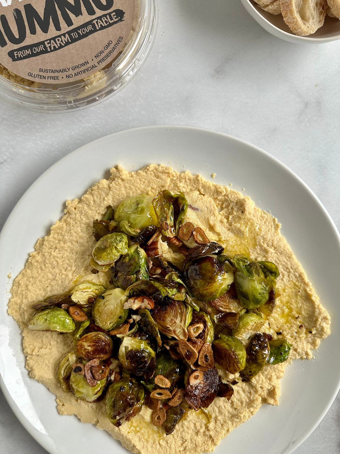 Crispy Brussels Sprouts with Hummus & Chili Oil